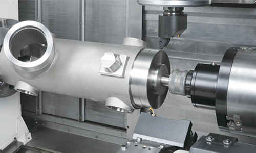 Turn-milling composite machining of a shaped metal part